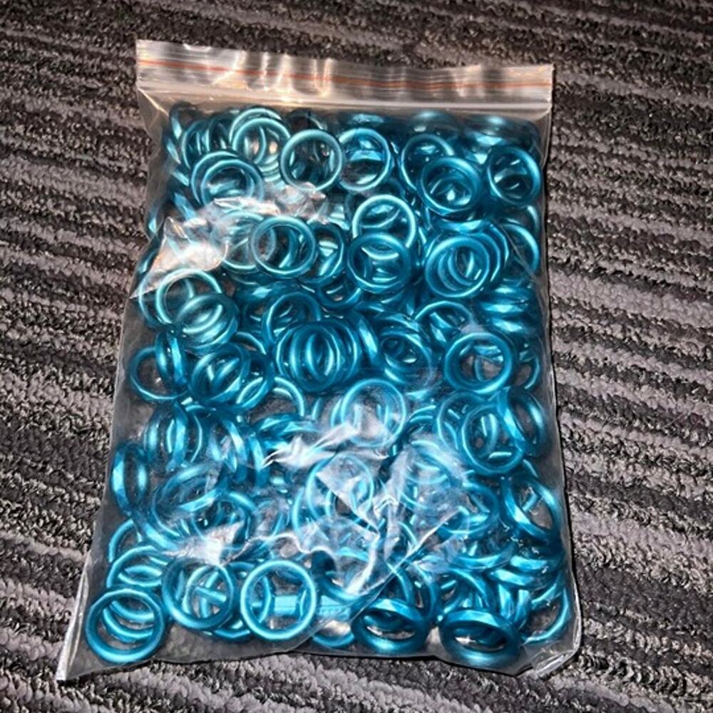 Turquoise metallic plastic circles for jewelry, crafting and art projects